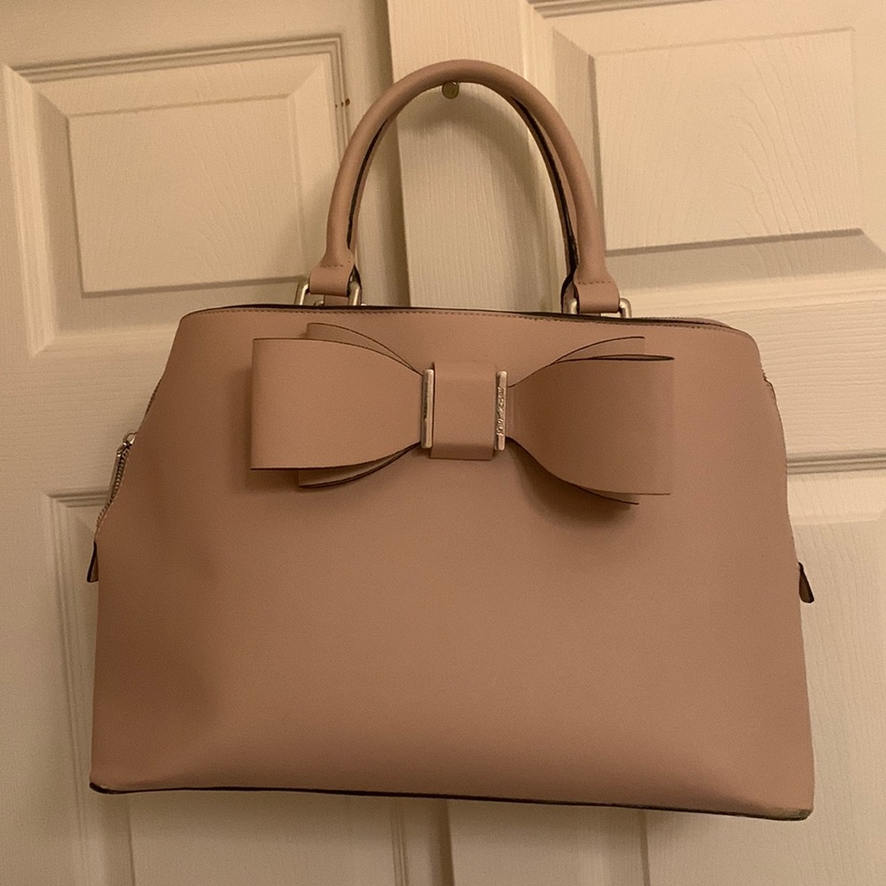 Tan Betsy Johnson tote bag with floral pink/black interior with 7 pockets